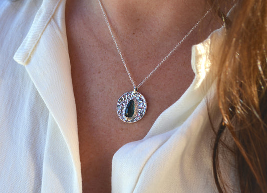 teal green tourmaline medallion